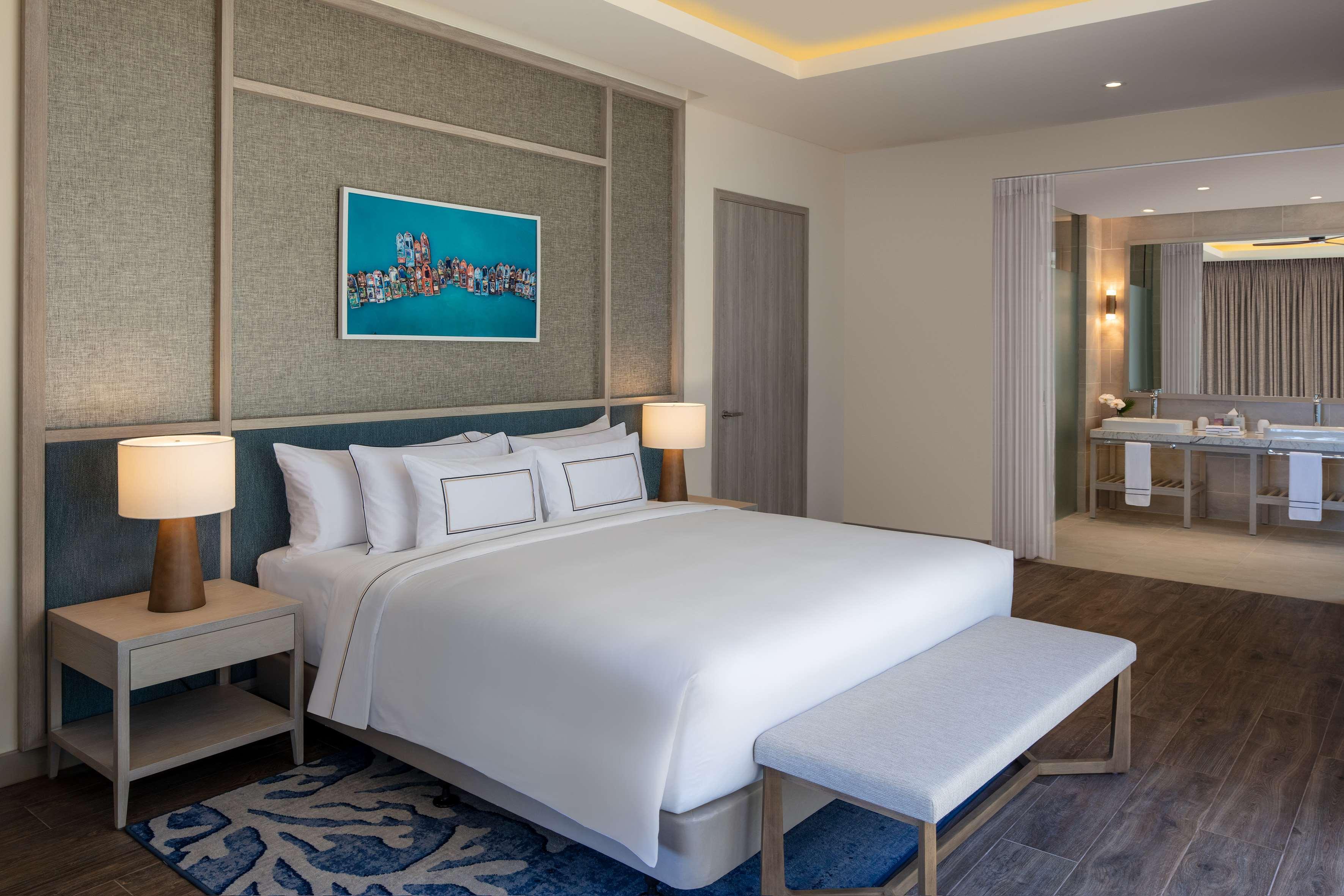 Melia Ho Tram Beach Resort Bagian luar foto A bedroom at the hotel