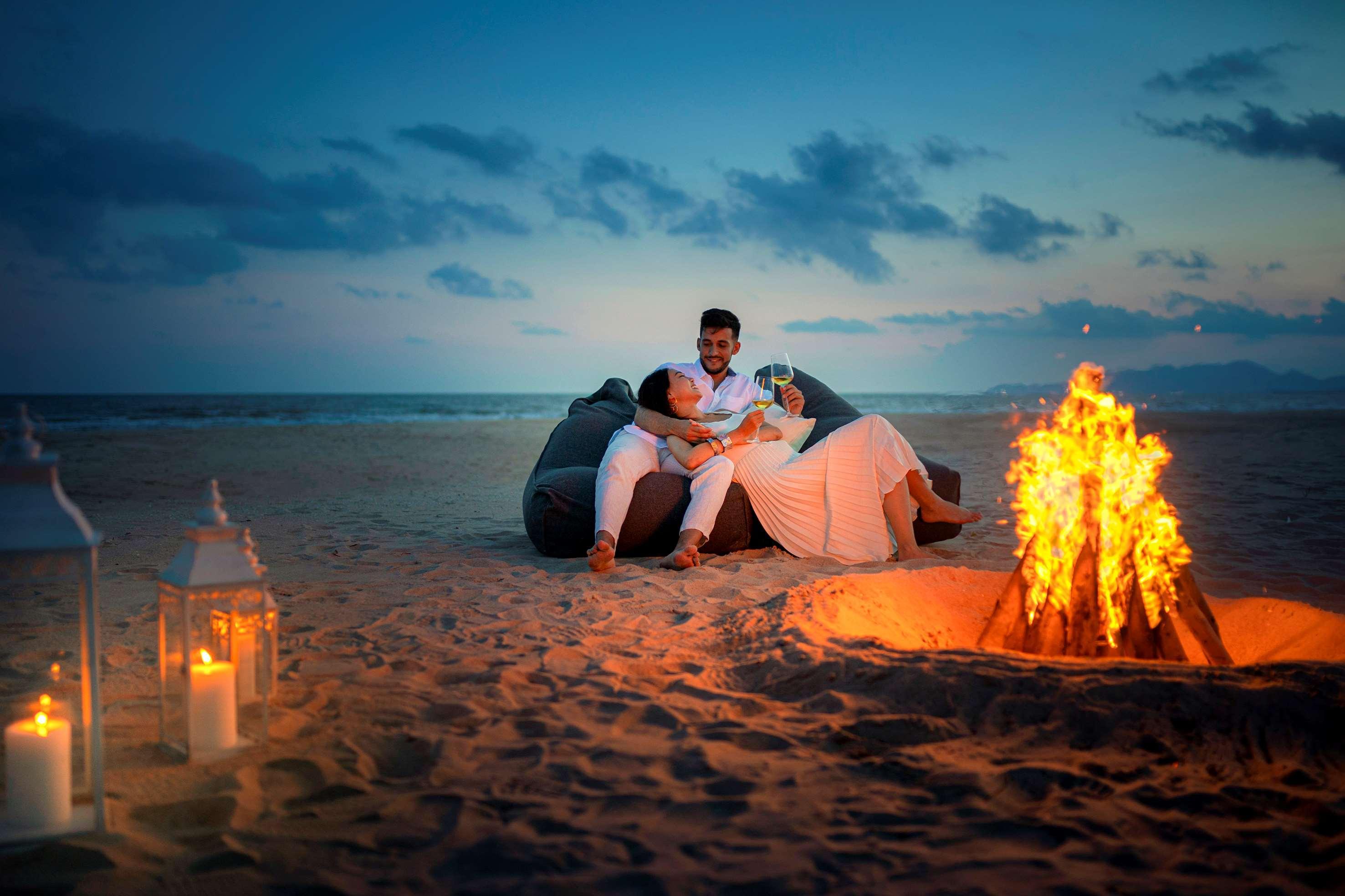 Melia Ho Tram Beach Resort Bagian luar foto A couple at the beach at the resort