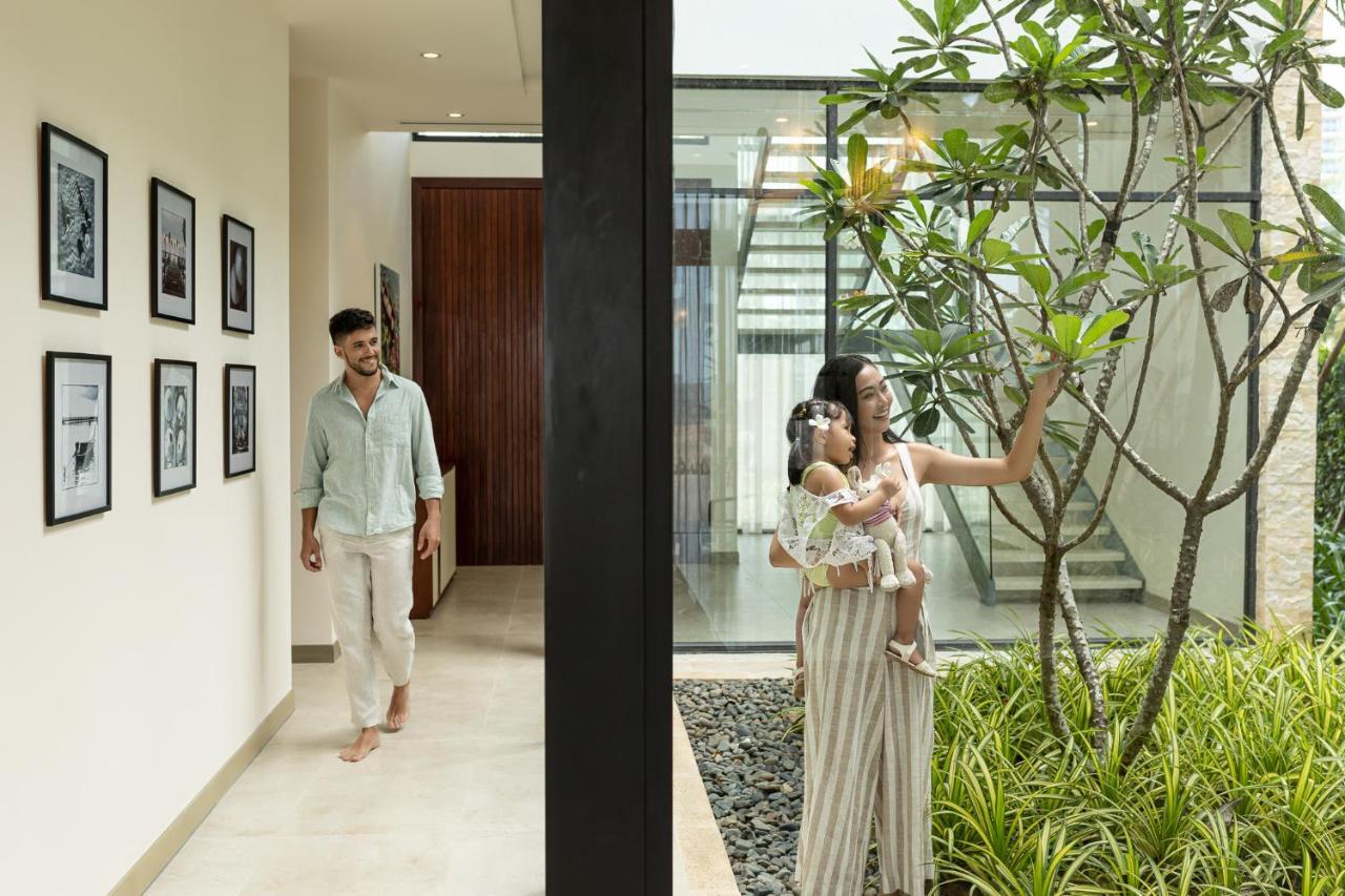 Melia Ho Tram Beach Resort Bagian luar foto A family at their home in Hyderabad